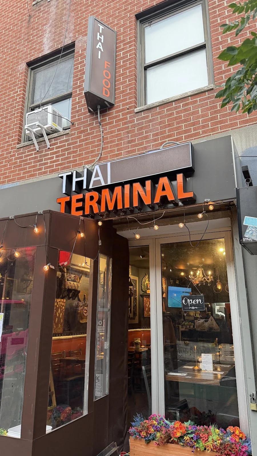 The Thai Terminal storefront with its orange sign on East 12th Street