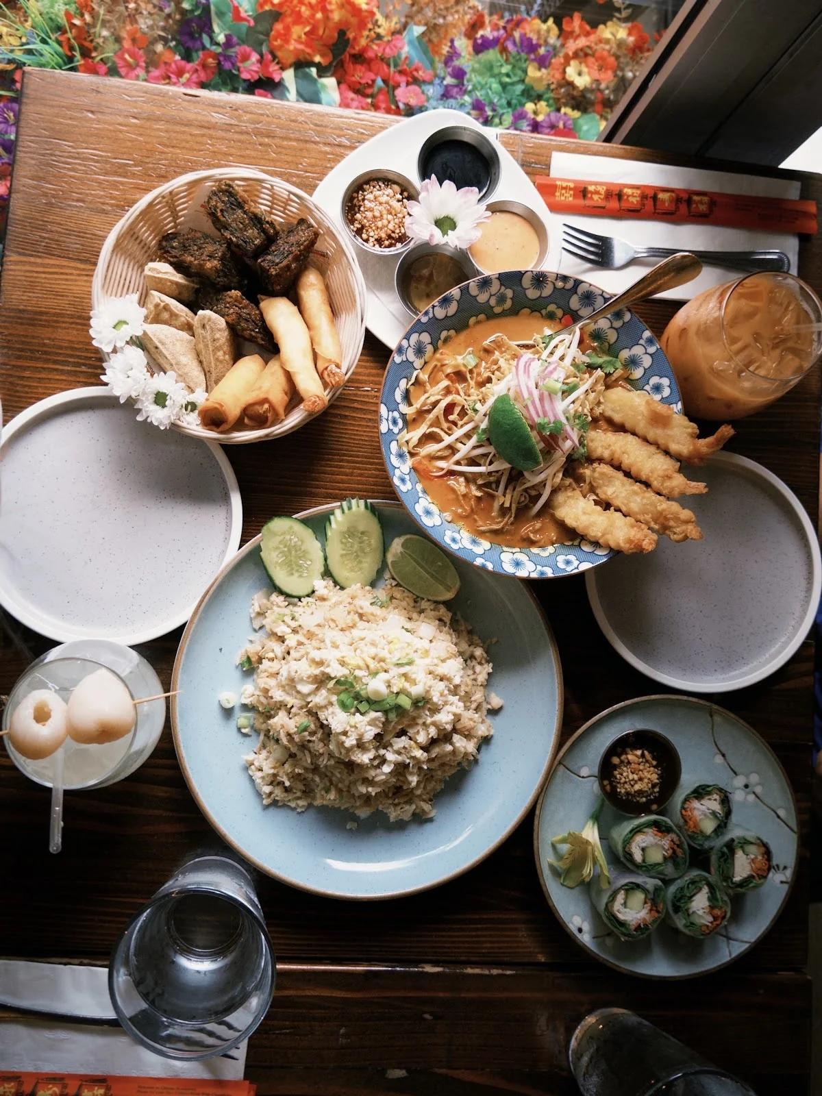 A table full of Thai dishes seen from above